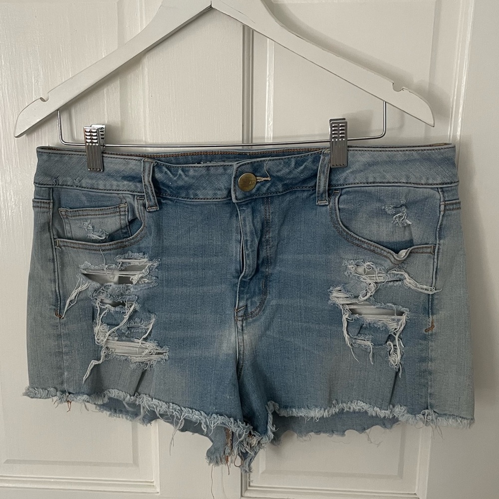 Light wash distressed jean shorts